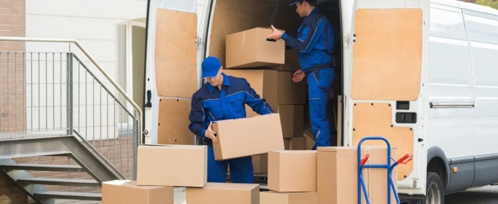 workers unloading a van