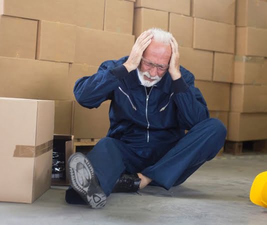injured worker holding head